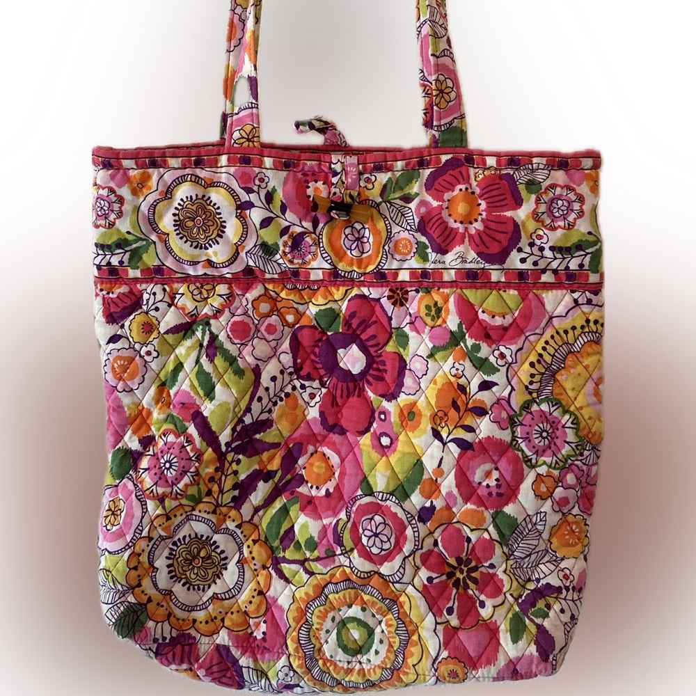 Vera Bradley tote bag, 12 x12 inches, 3 inner pockets that could fit a phone